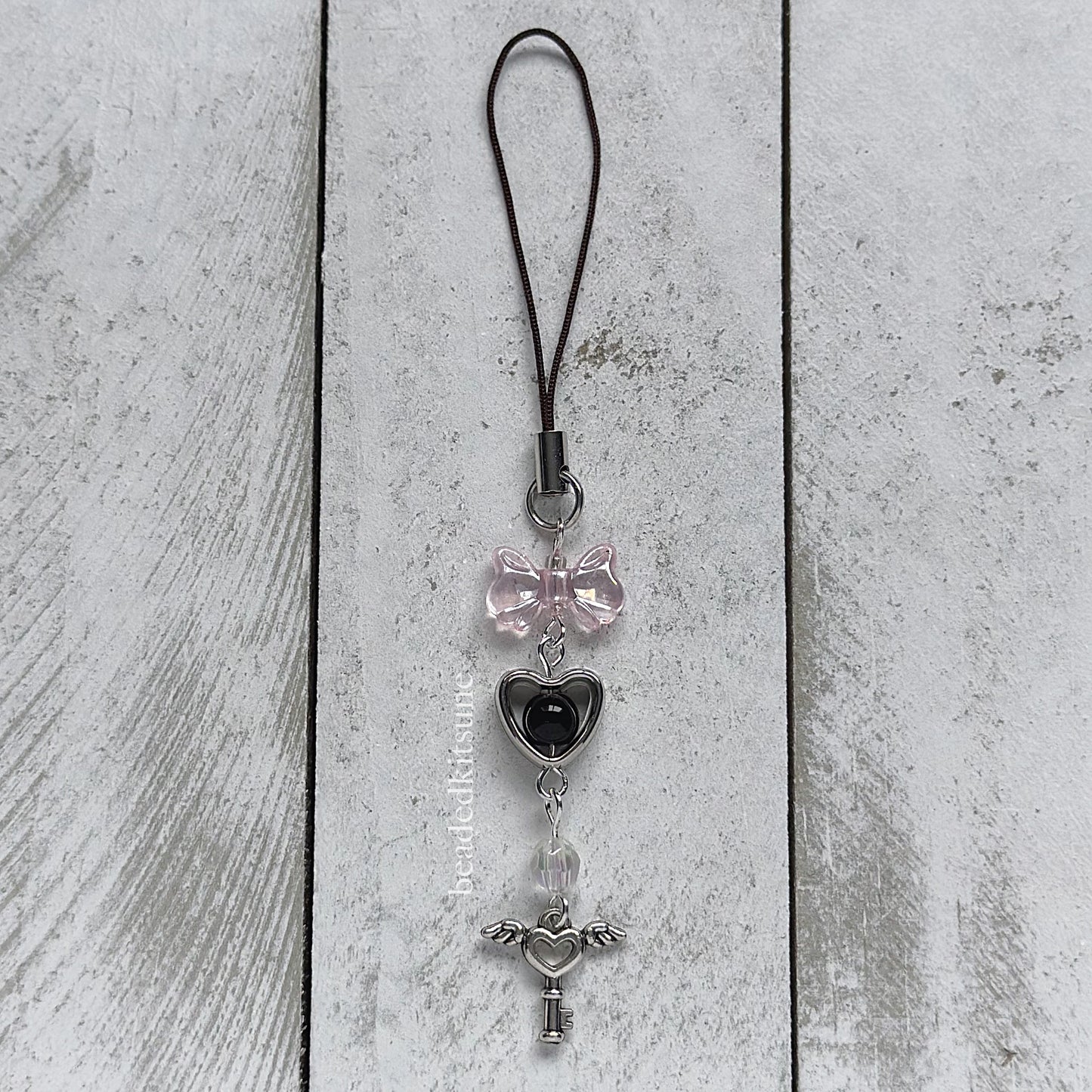 Bowed Phone charms